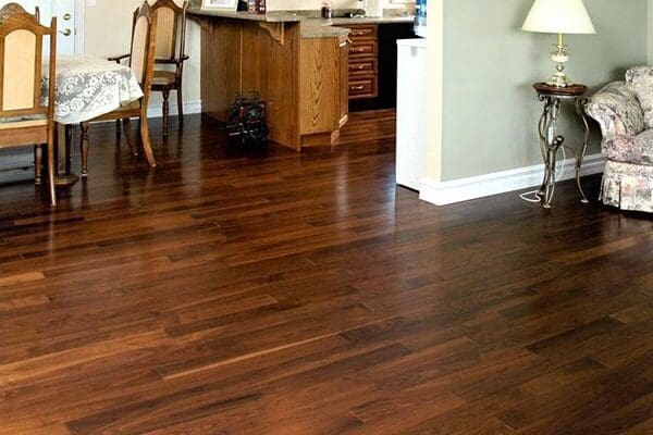 A room with wood floors and a chair.