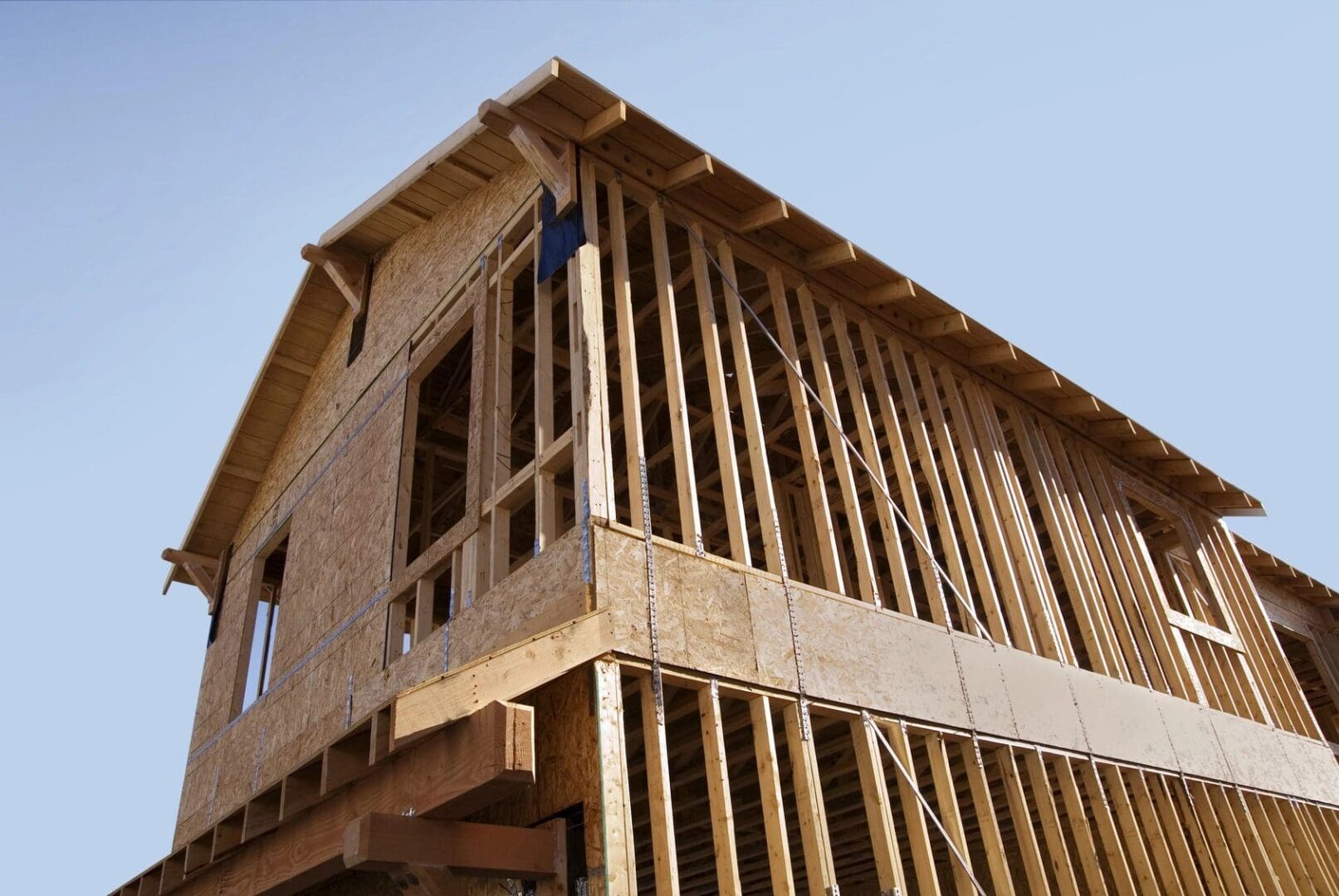 A building under construction with wood framing.